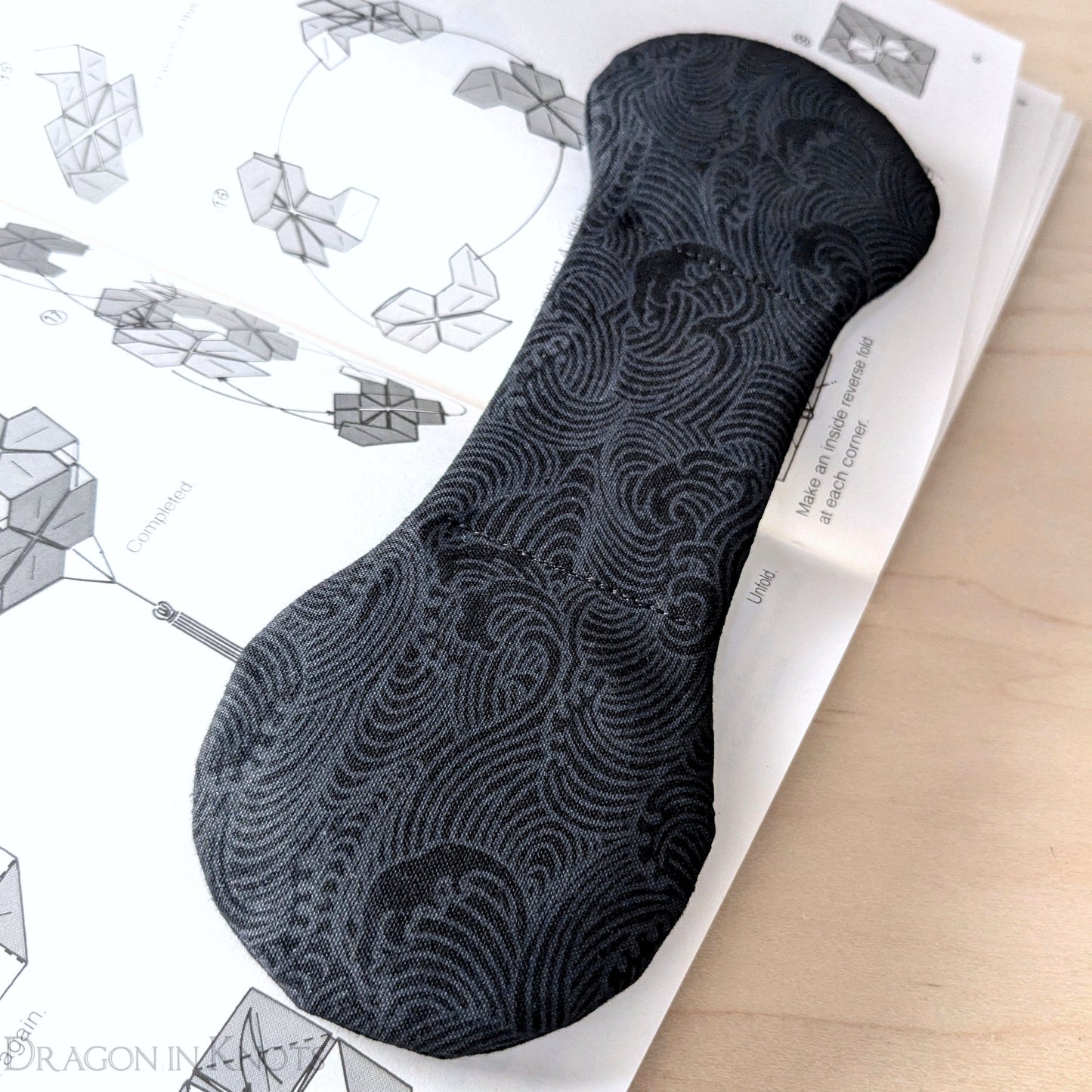 Black Ocean Waves Book Weight - Dragon in Knots