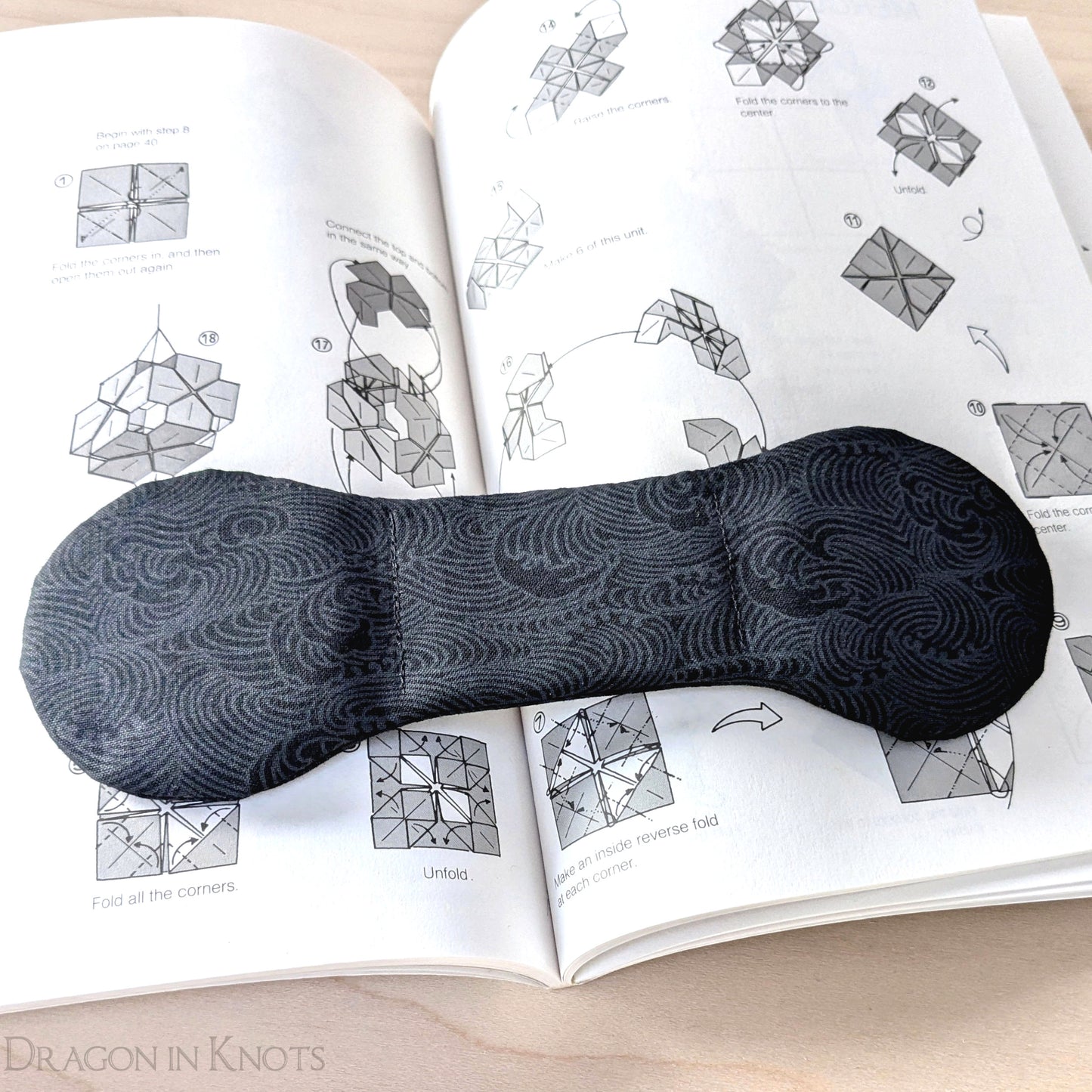 Black Ocean Waves Book Weight - Dragon in Knots