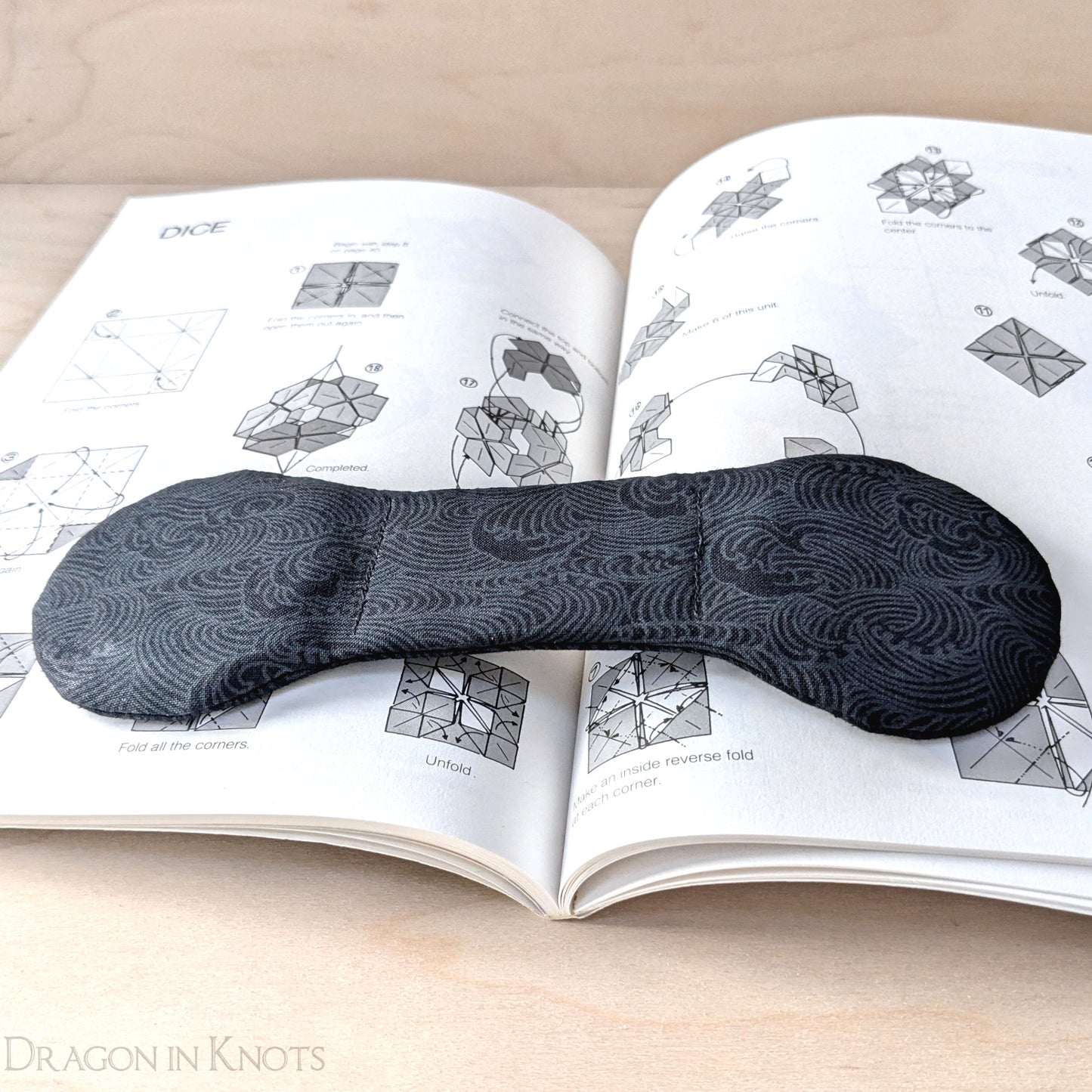 Black Ocean Waves Book Weight - Dragon in Knots