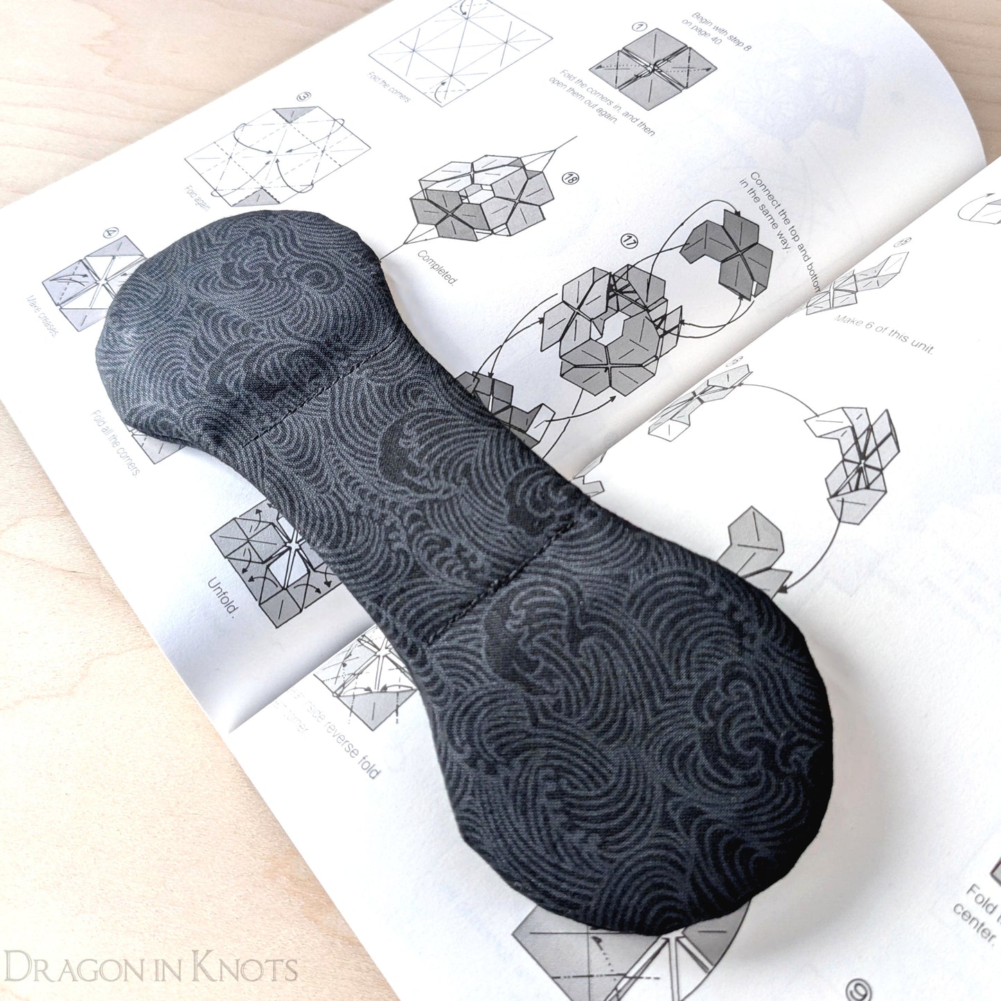 Black Ocean Waves Book Weight - Dragon in Knots