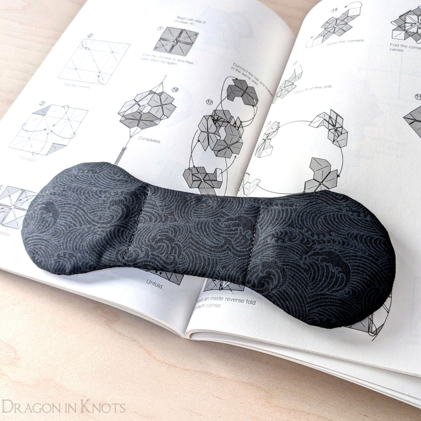 Black Ocean Waves Book Weight - Dragon in Knots