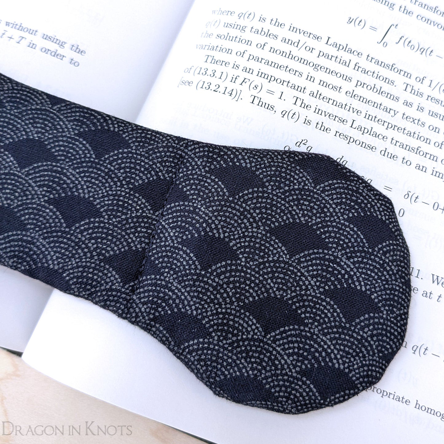 Waves on Dark Navy Book Weight - Dragon in Knots