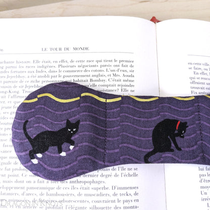 Black Cats on Purple Book Weight