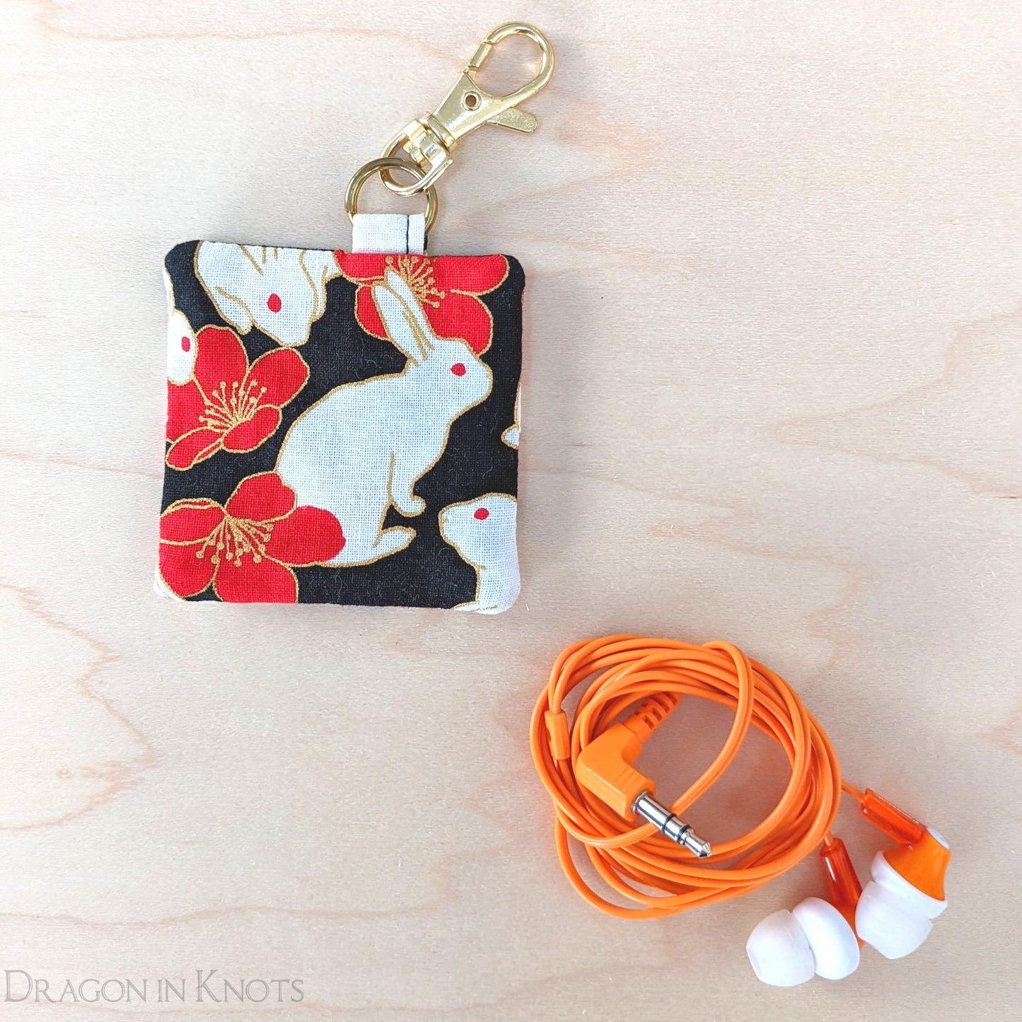 White Bunny Earbud Holder - Dragon in Knots
